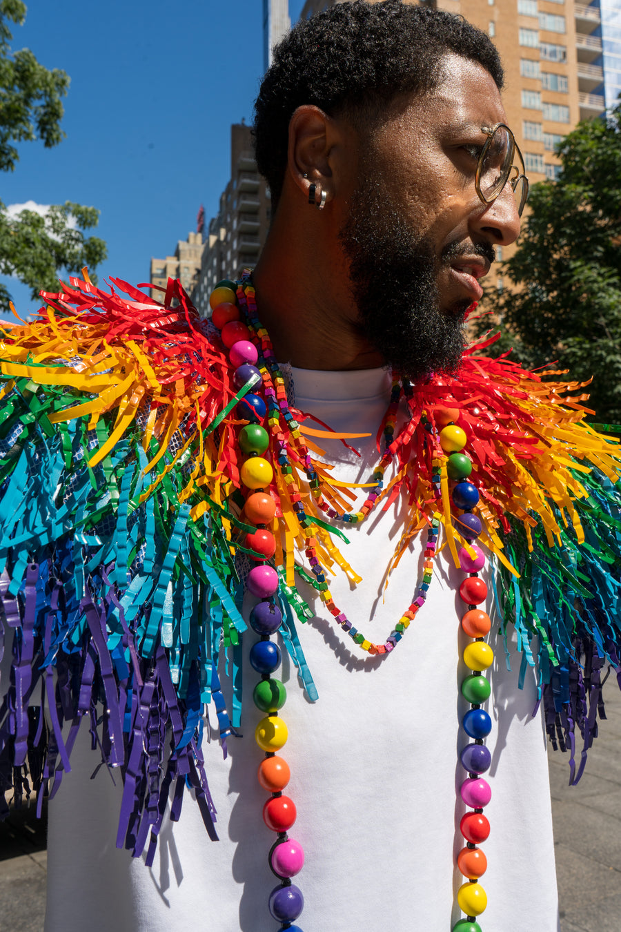 Hand-painted rainbow plastic bottle fringe cape