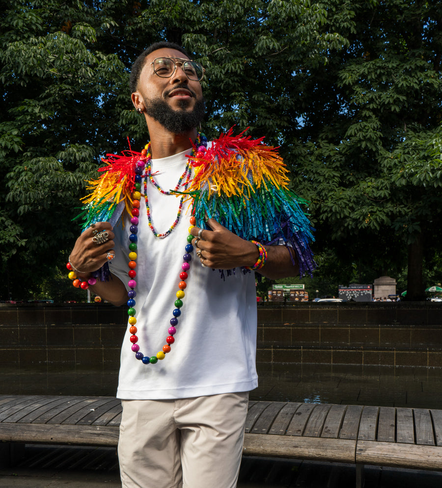 Hand-painted rainbow plastic bottle fringe cape