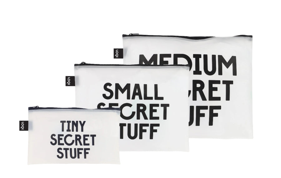 Three transparent soft matte plastic pouches with black text, all three on a on a white background